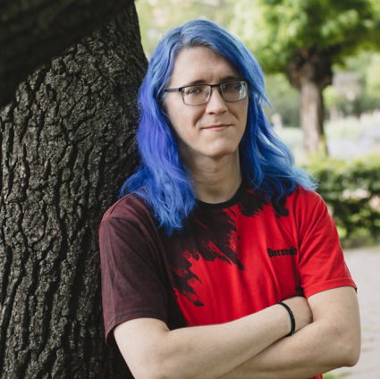 Marshall Laszlo Toth - Software Engineer with blue hair, building systems that survive reality